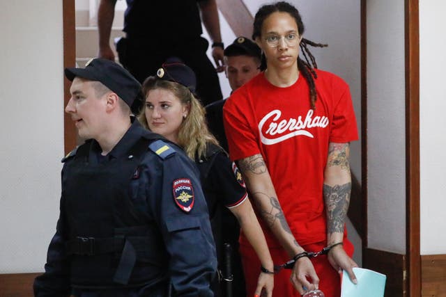 <p>Two-time Olympic gold medalist and WNBA’s Phoenix Mercury Brittney Griner (R) is escorted to a courtroom for a hearing, in Khimki City Court, outside Moscow</p>