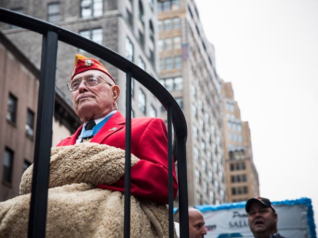 <p>Williams on a float during the 2013 Veterans Day Parade in New York </p>