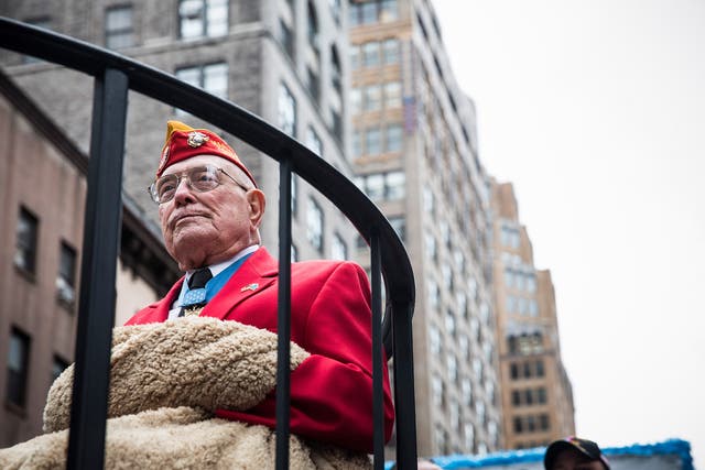 <p>Williams on a float during the 2013 Veterans Day Parade in New York </p>