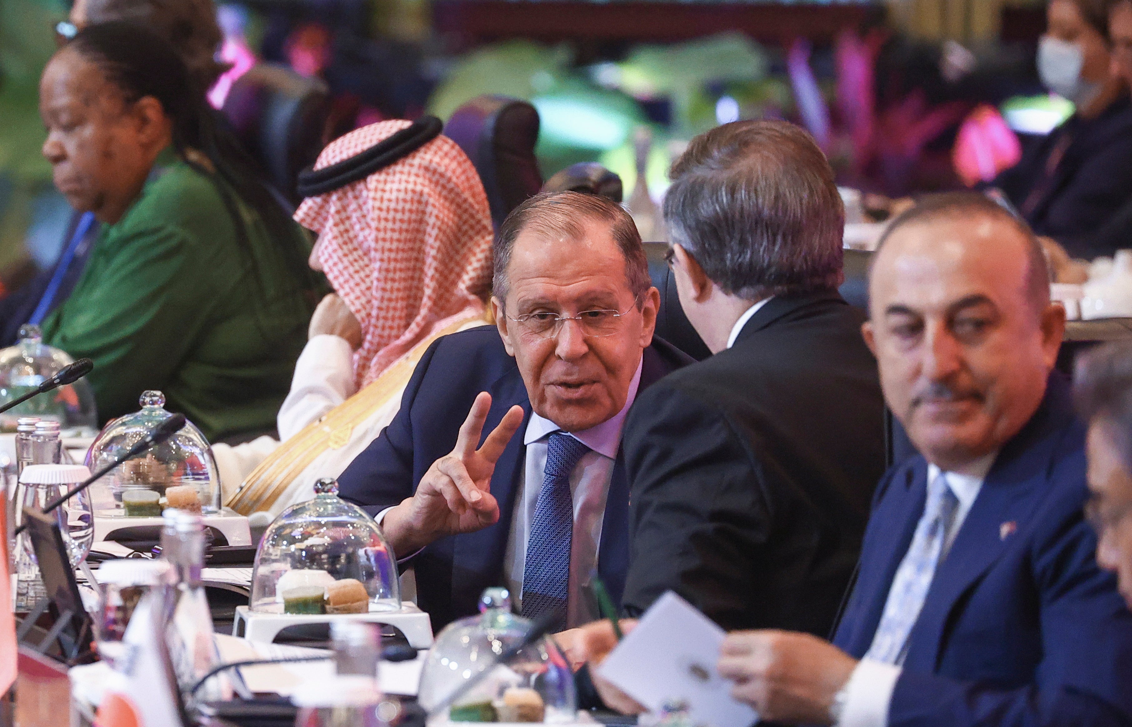 Russian foreign ministry press service shows Sergei Lavrov talking with Mexican foreign affairs secretary Marcelo Ebrard before the start of the opening session of the G20 Foreign Ministers' Meeting