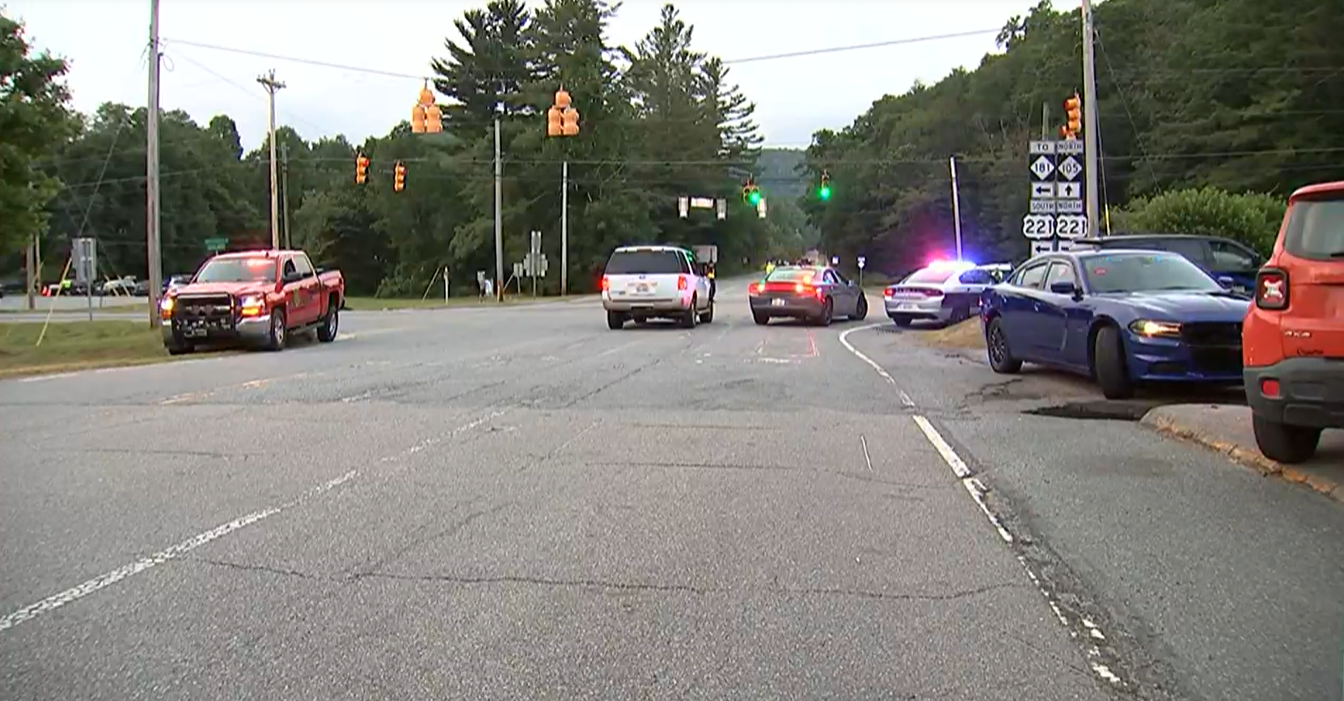 One woman is dead and at least three hurt after the driver of a van reportedly swerved into a group of runners at a popular 5-mile race in North Carolina