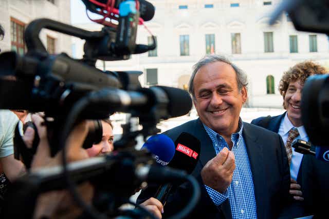 Michel Platini spoke to the media outside the Swiss federal criminal court after his acquittal on Friday (Alessandro Crinari/AP)