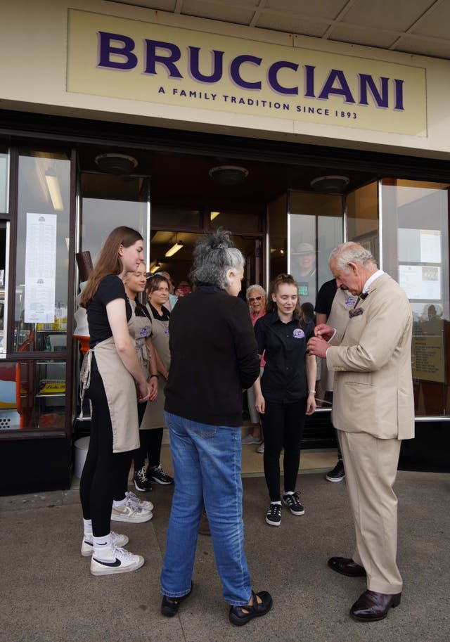 The Prince of Wales receives an ice cream after a visit to the Winter Gardens in Morecambe, Lancashire (Peter Byrne/PA)