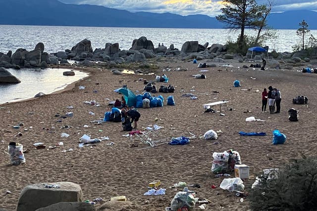 <p>Trash piled up on the shores of California’s Lake Tahoe after Independence Day </p>