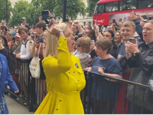<p>Andrea Jenkyns was walking past people protesting Boris Johnson when she made the gesture </p>