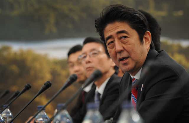 Shinzo Abe at the G8 Summit in Enniskillen, Northern Ireland in 2013 (PA)