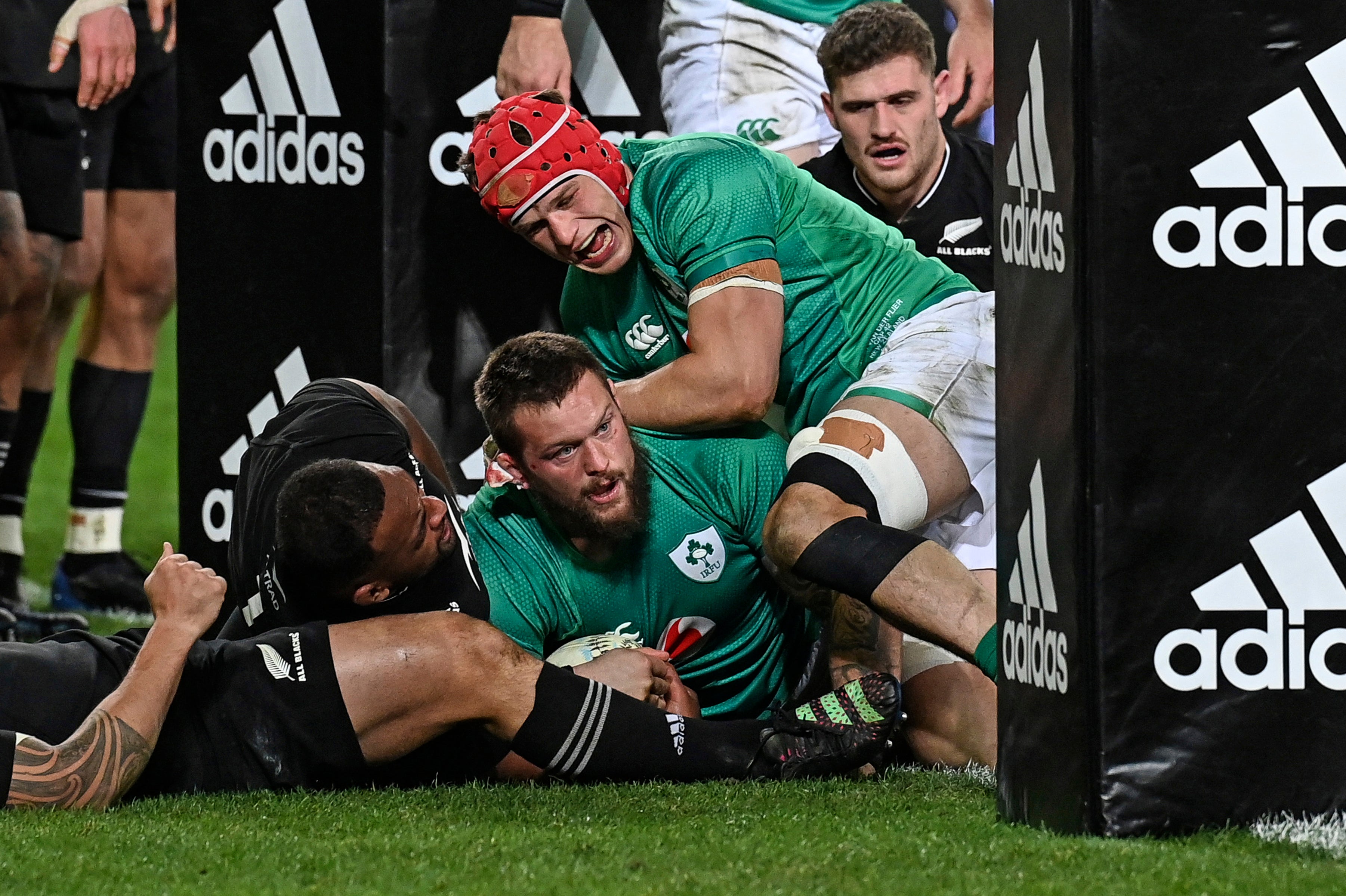 Porter (bottom centre) scores his second try for Ireland