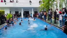 Sri Lankan protesters swim in president’s pool after storming official residence