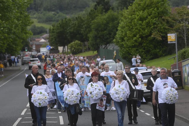 A large crowd attends a march to mark the 50th anniversary of the shooting dead of five people in Springhill, west Belfast. Picture date: Saturday July 9, 2022.