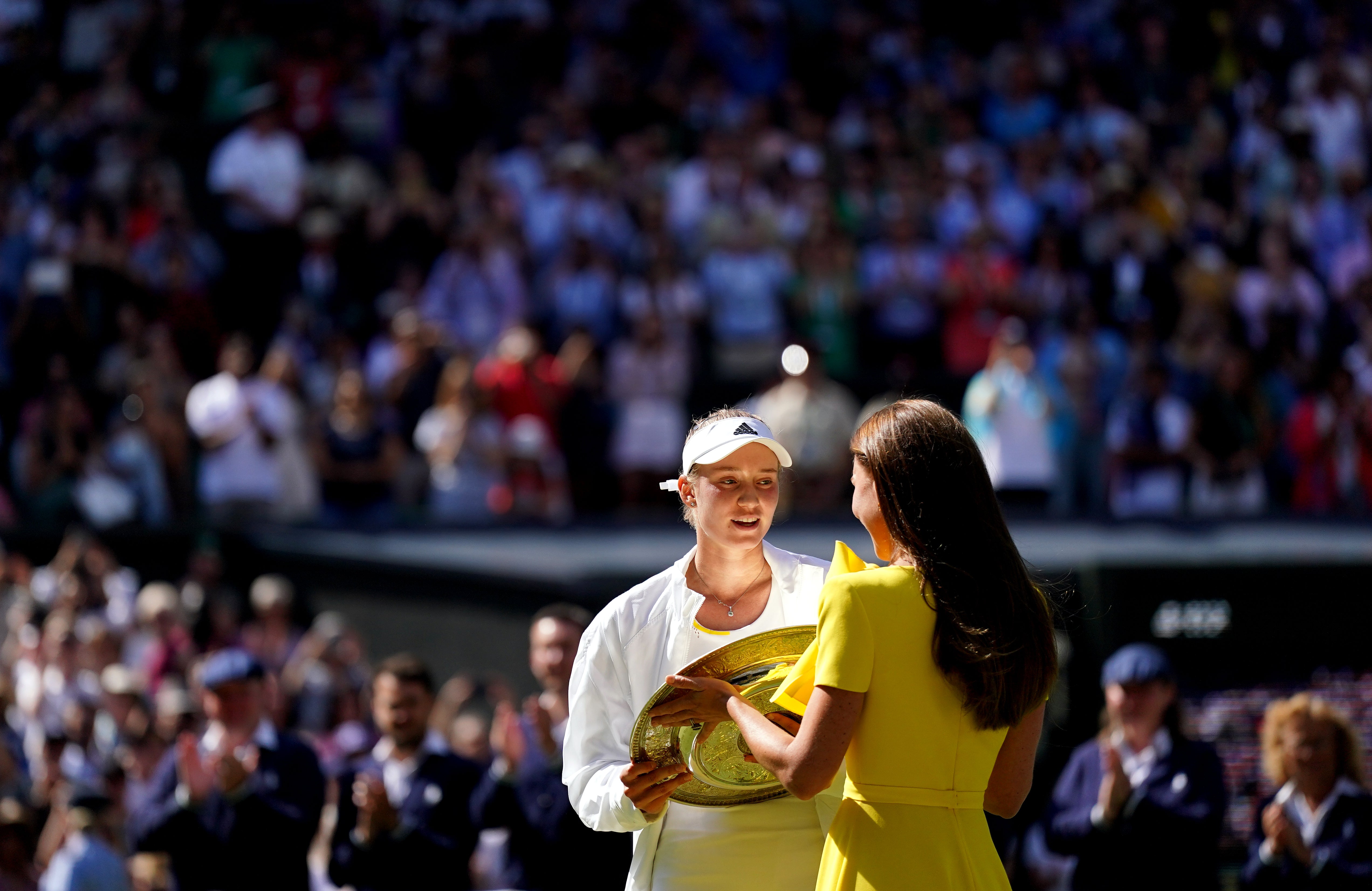 Elena Rybakina is presented with the trophy by the Duchess of Cambridge (Zac Goodwin/PA)