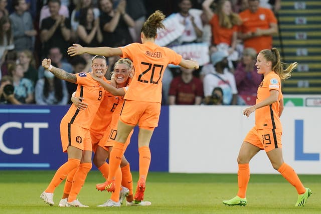 Jill Roord, second left, celebrates her equaliser with team-mates (Danny Lawson/PA)