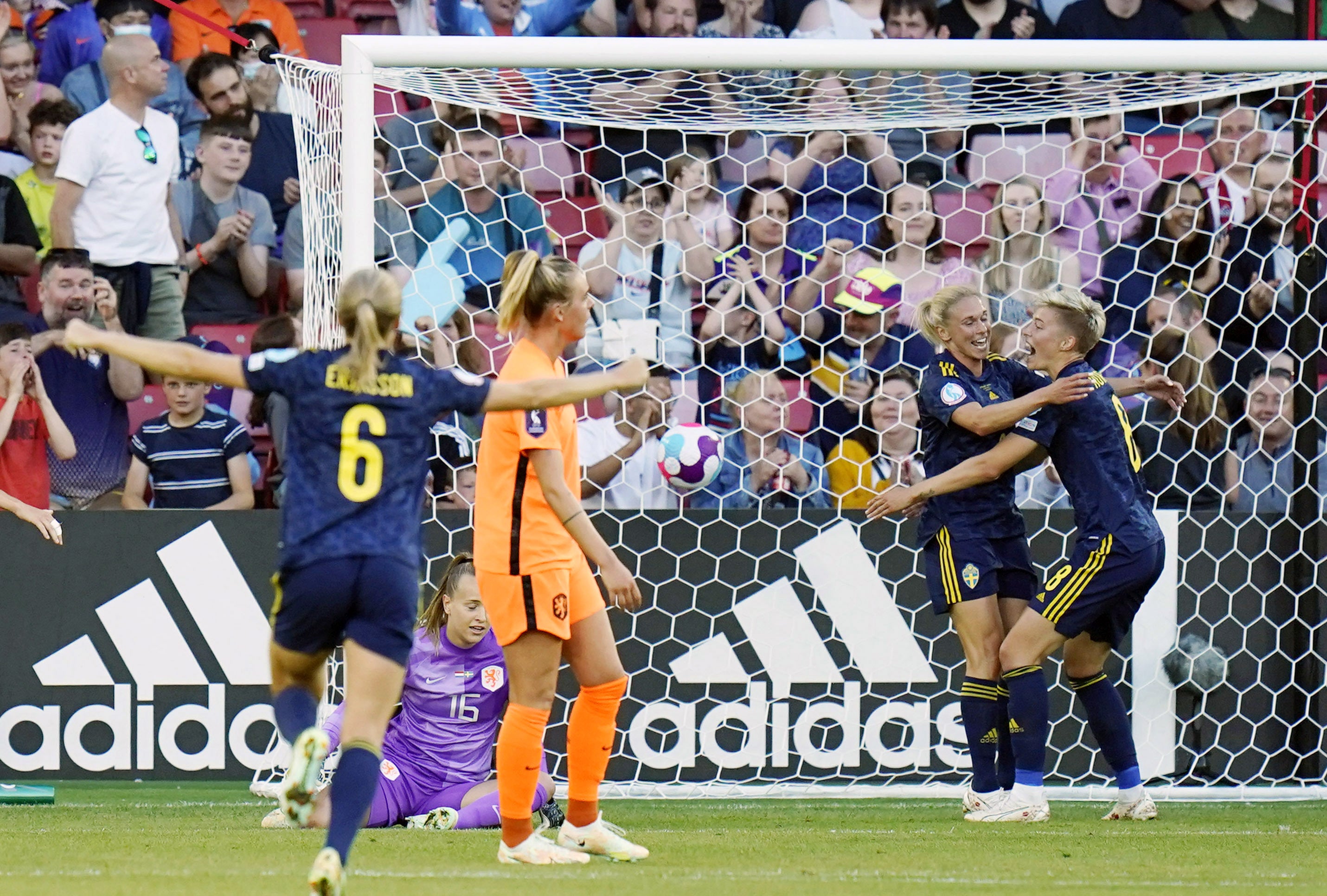 Jonna Andersson, second right, celebrates her opener with Lina Hurtig (Danny Lawson/PA)