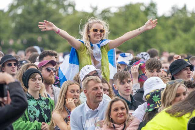 Festival-goers watch The Lathums, perform on the main stage on the first day of the TRNSMT Festival at Glasgow Green in Glasgow. Picture date: Friday July 8, 2022.