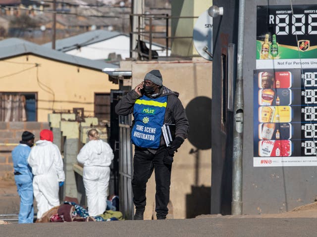 <p>At least 15 people have died after gunmen opened fire at a bar in the South African township of Soweto</p>