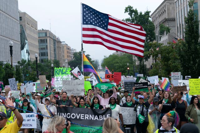 <p>Pro-choice activists march at a rally in Washington DC in July </p>