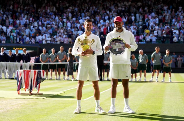 Wimbledon champion Novak Djokovic alongside runner-up Nick Kyrgios (Zac Goodwin/PA)
