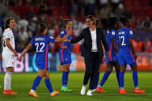 France head coach Corinne Diacre (centre) celebrates with her players (Nick Potts/PA).