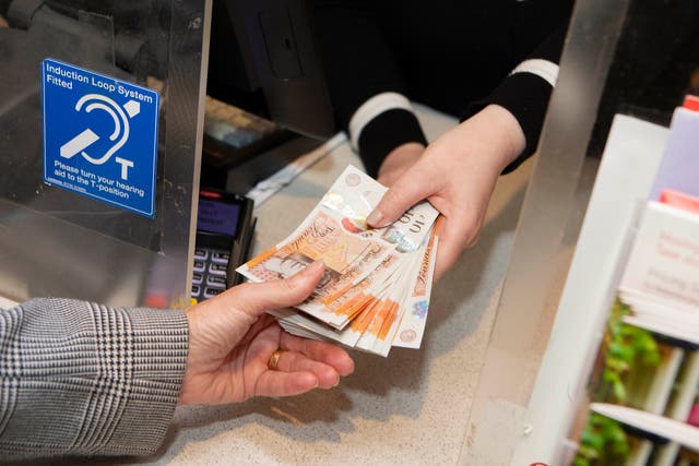 An estimated 500,000 Scots rely on cash (Lucy Ray/PA)