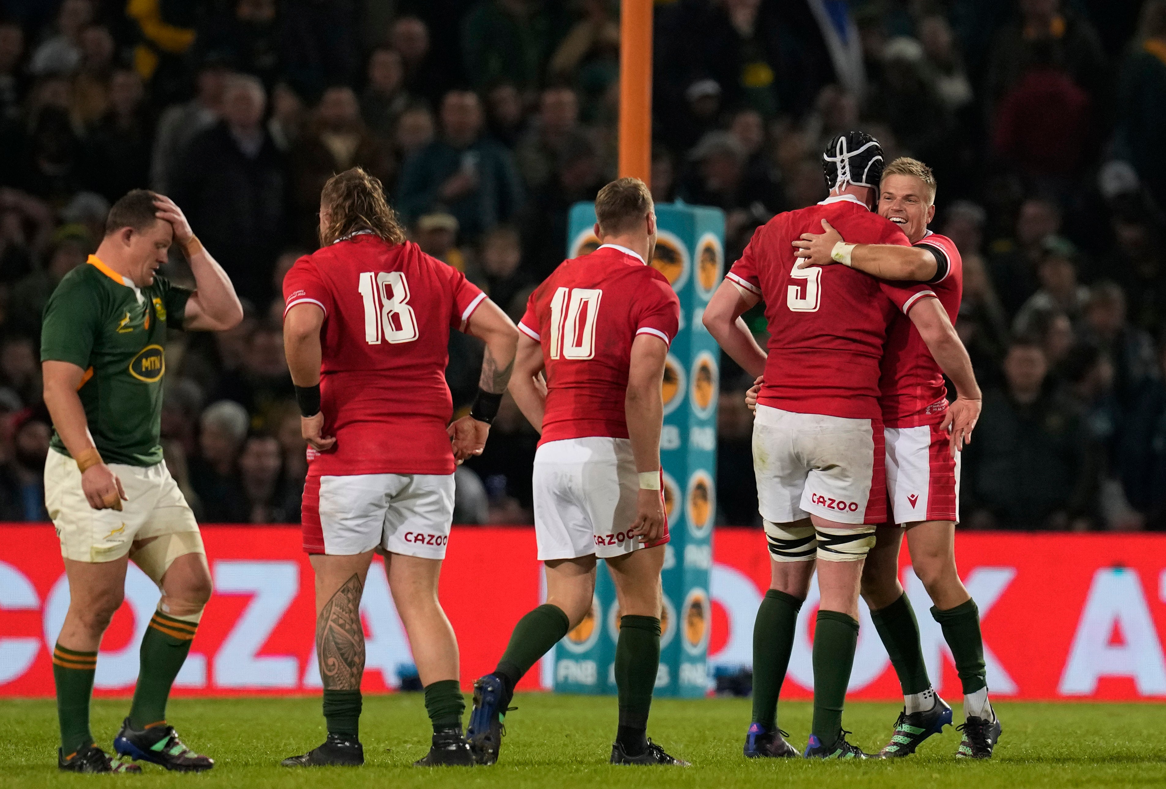 Gareth Anscombe (far right) kicked a last-gasp conversion as Wales beat South Africa 13-12 in Bloemfontein to set up a series decider next week (Themba Hadebe/AP)