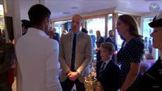 Prince George holds Novak Djokovic’s Wimbledon trophy