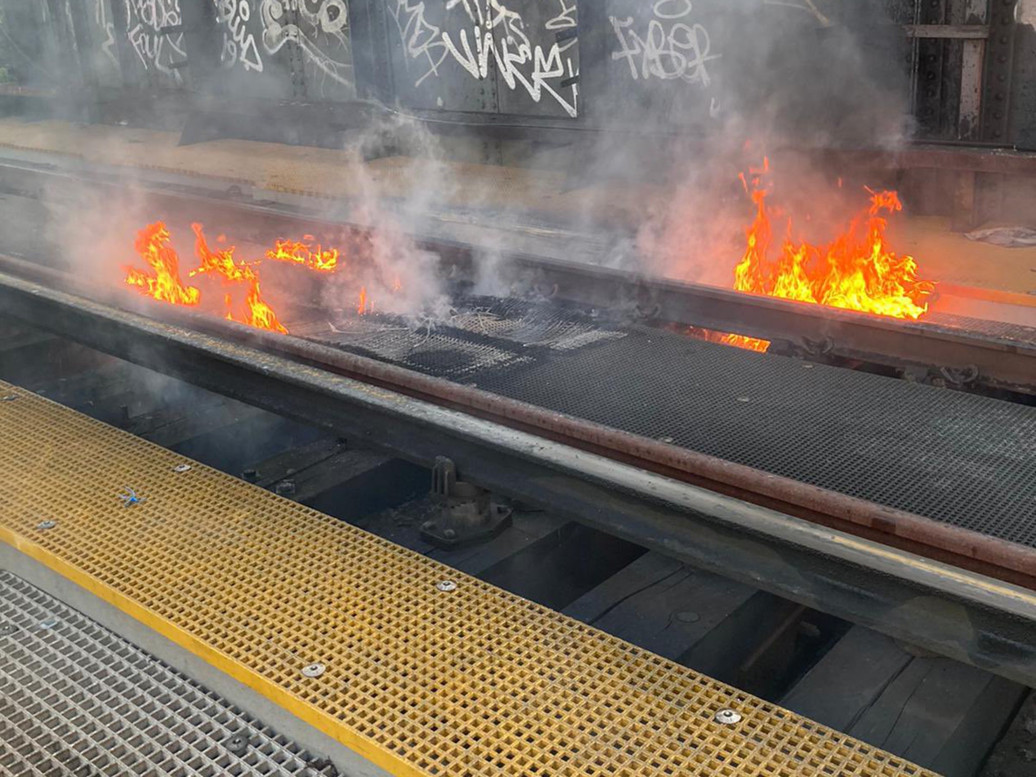 The heat in London caused train tracks to catch fire on Monday