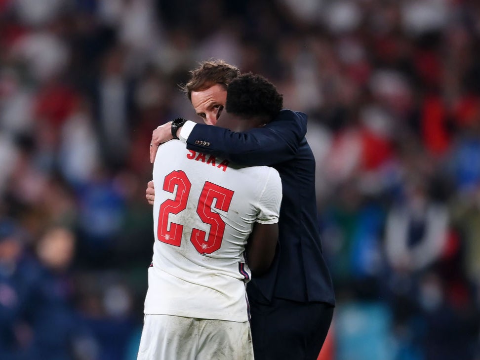 Bukayo Saka is consoled by Gareth Southgate after missing a penalty in the Euro 2020 final