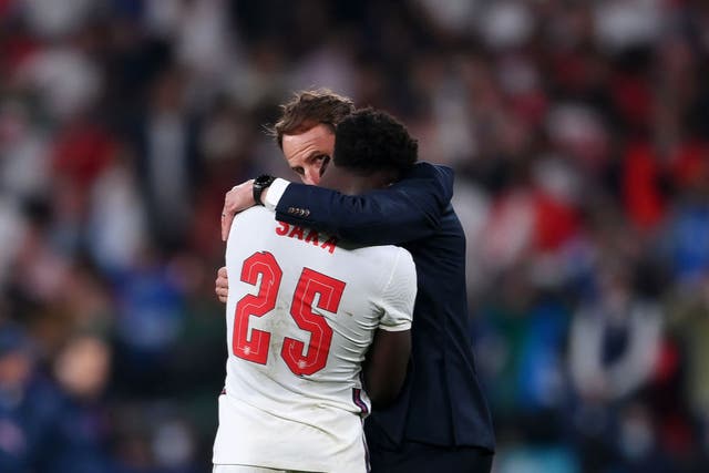 <p>Bukayo Saka is consoled by Gareth Southgate after missing a penalty in the Euro 2020 final</p>