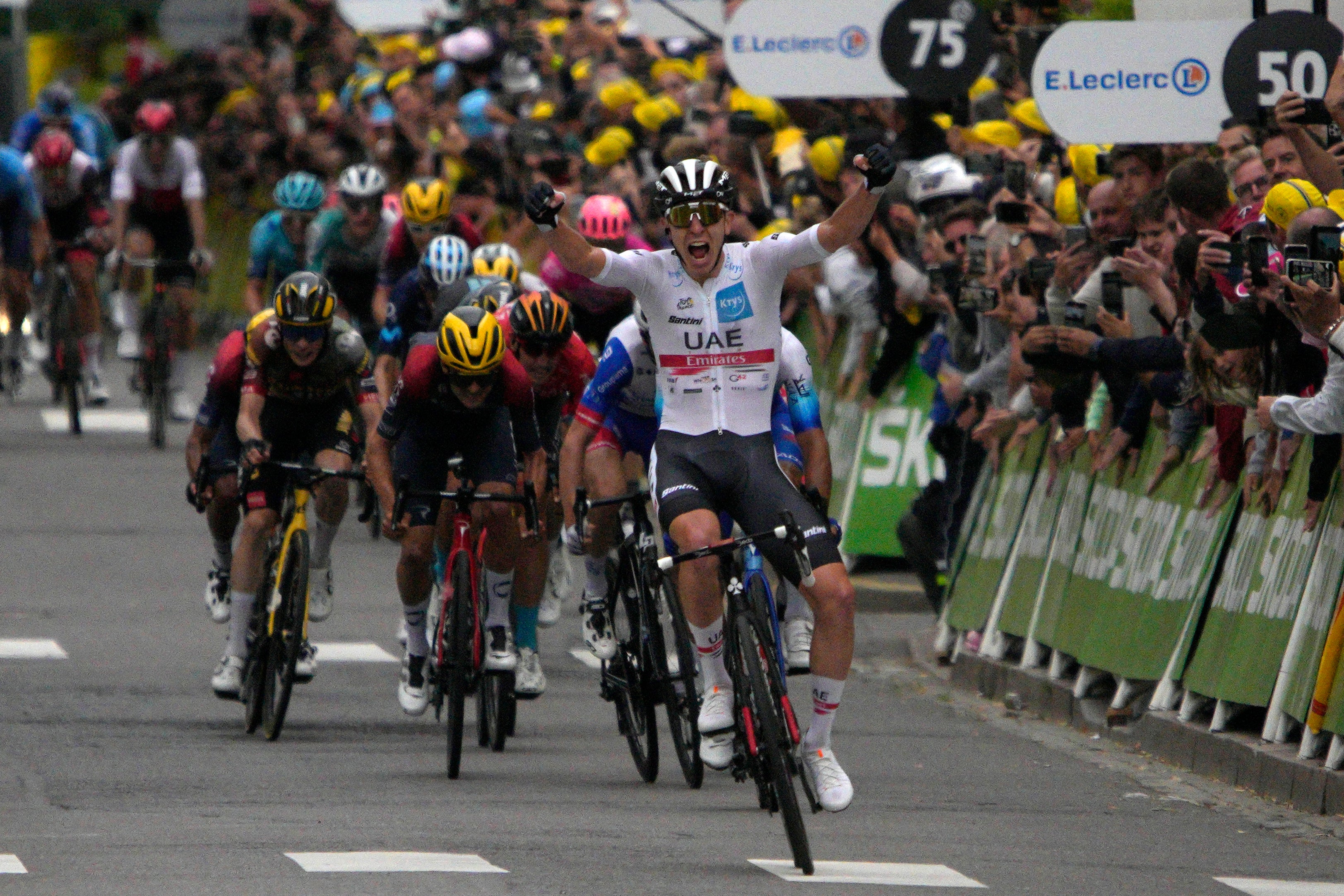 Pogacar took the yellow jersey after winning stage six in Longwy on Thursday (Daniel Cole/AP)