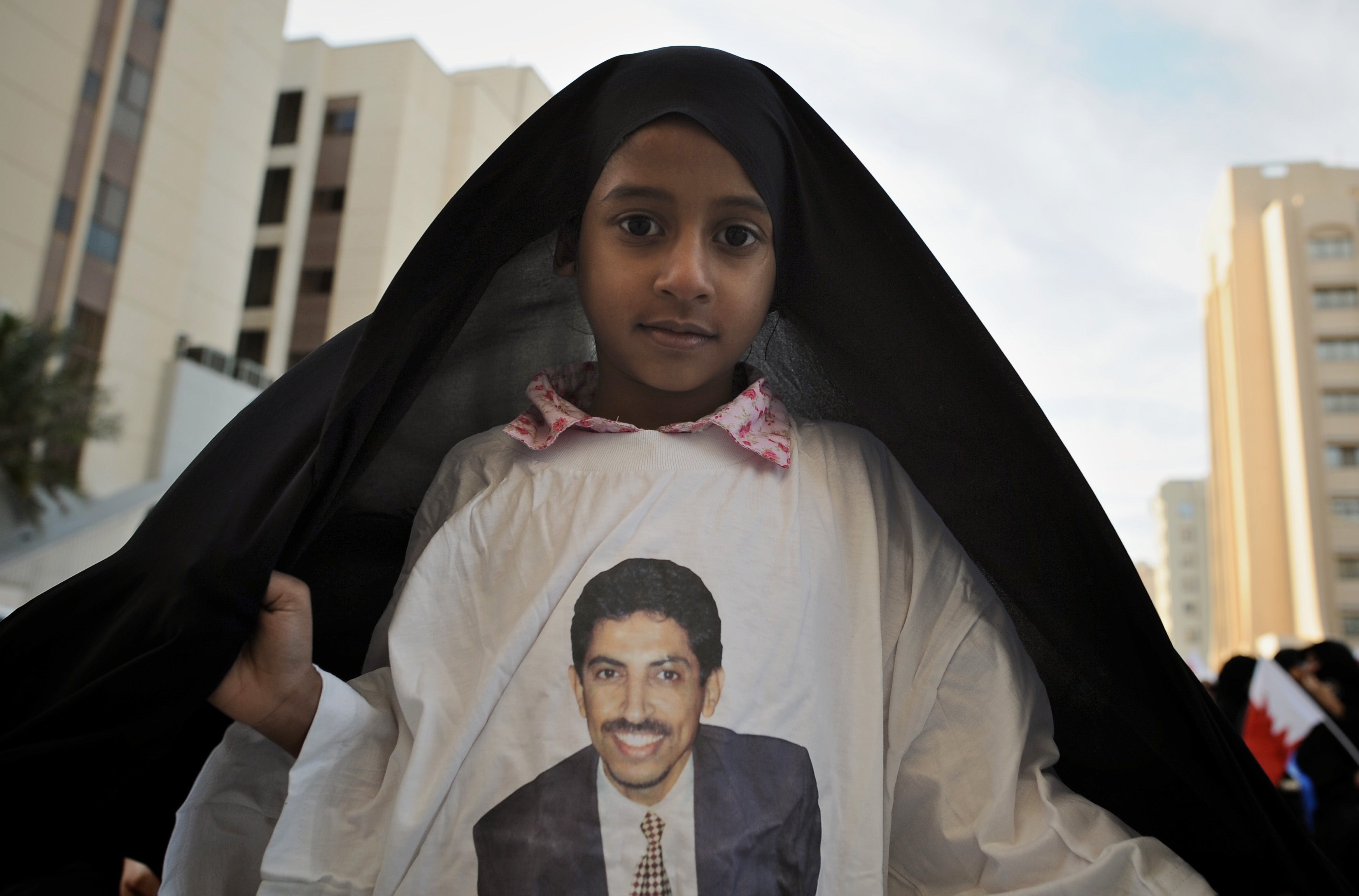 Bahraini girl wears top with image of Abdulhadi al-Khawaja, prominent Bahraini human rights activist currently serving life sentence