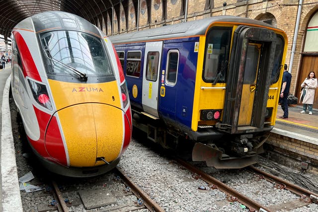 <p>Stopping trains? Drivers working for LNER (train on left) and Northern (right) have voted overwhelmingly to strike</p>