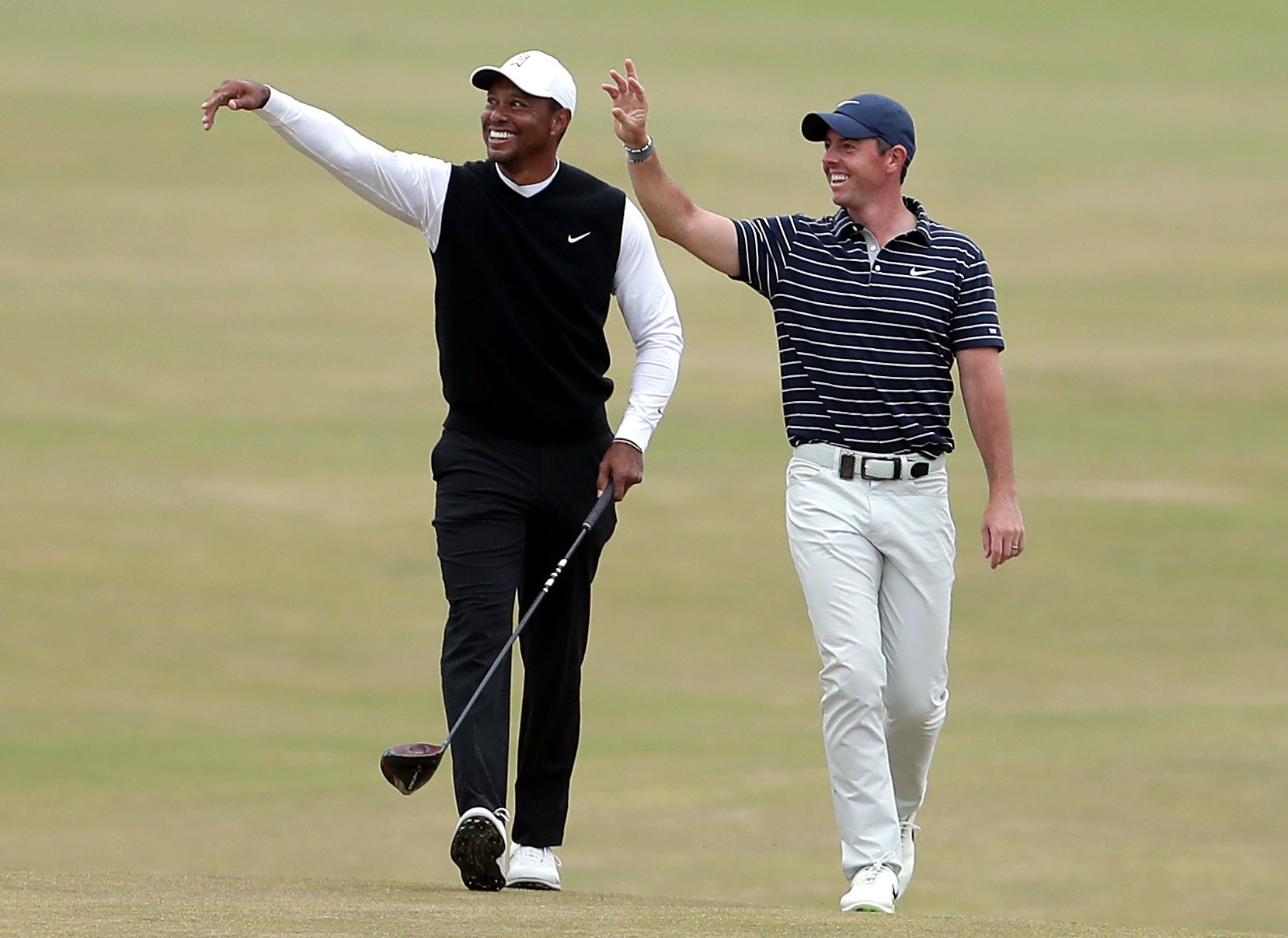 Tiger Woods (left) and Rory McIlroy on the 18th fairway during the R&A Celebration of Champions event at the Old Course, St Andrews (Richard Sellers/PA)