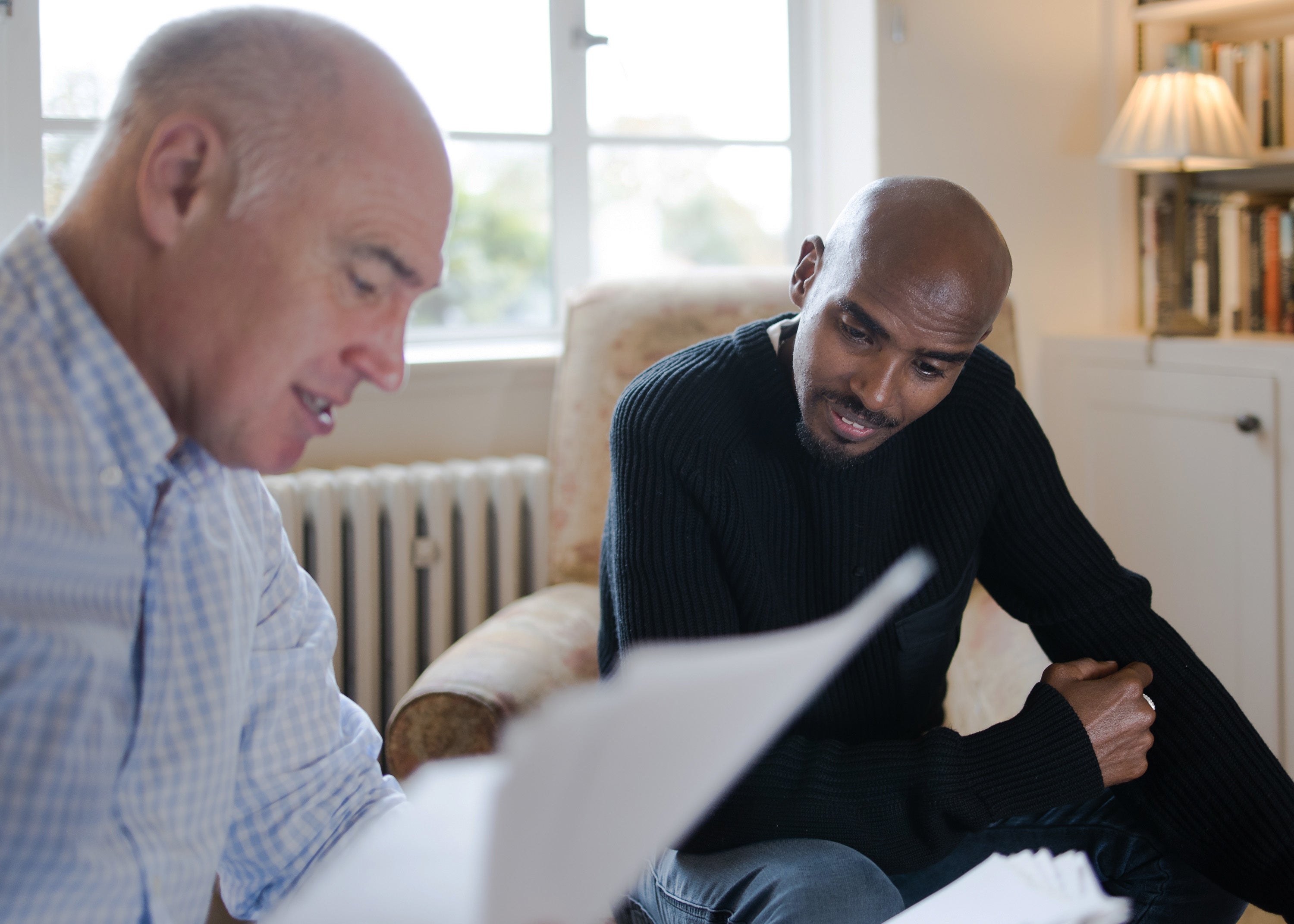 Sir Mo Farah with his old PE teacher Alan Watkinson, who helped him get British Citizenship