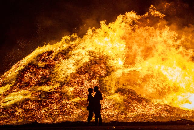 Fire and rescue crews in Northern Ireland recieved a total of 203 emergency calls on the first night of celebrations for the Twelfth of July (Liam McBurney/PA)