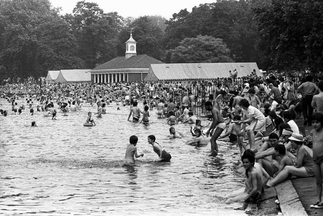 <p>The scene at the Serpentine in London’s Hyde Park as people enjoy the heatwave in July 1976</p>