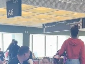 The fight, allegedly captured at Cleveland Airport