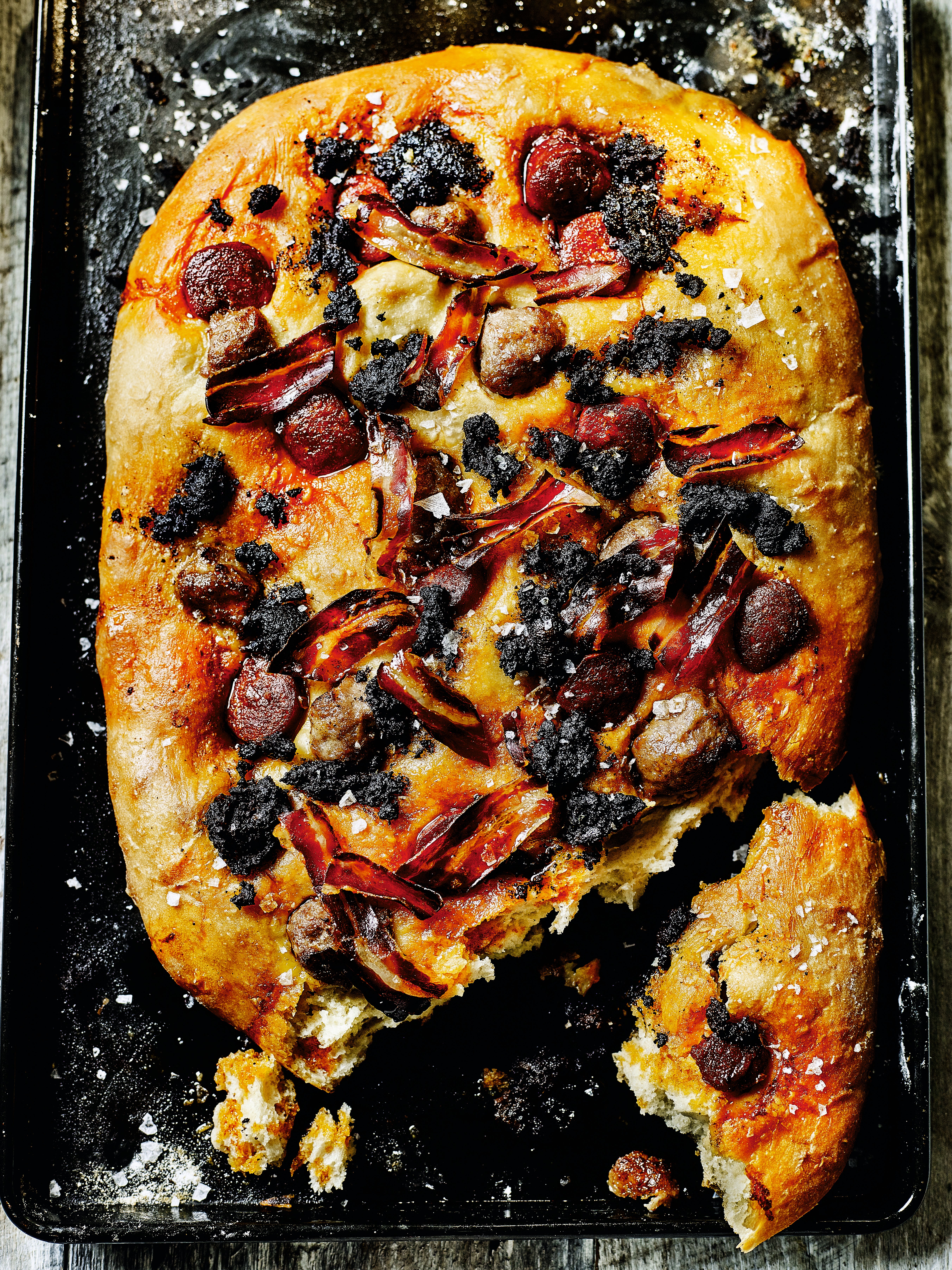 This meat focaccia is kind of like a British toad in the hole