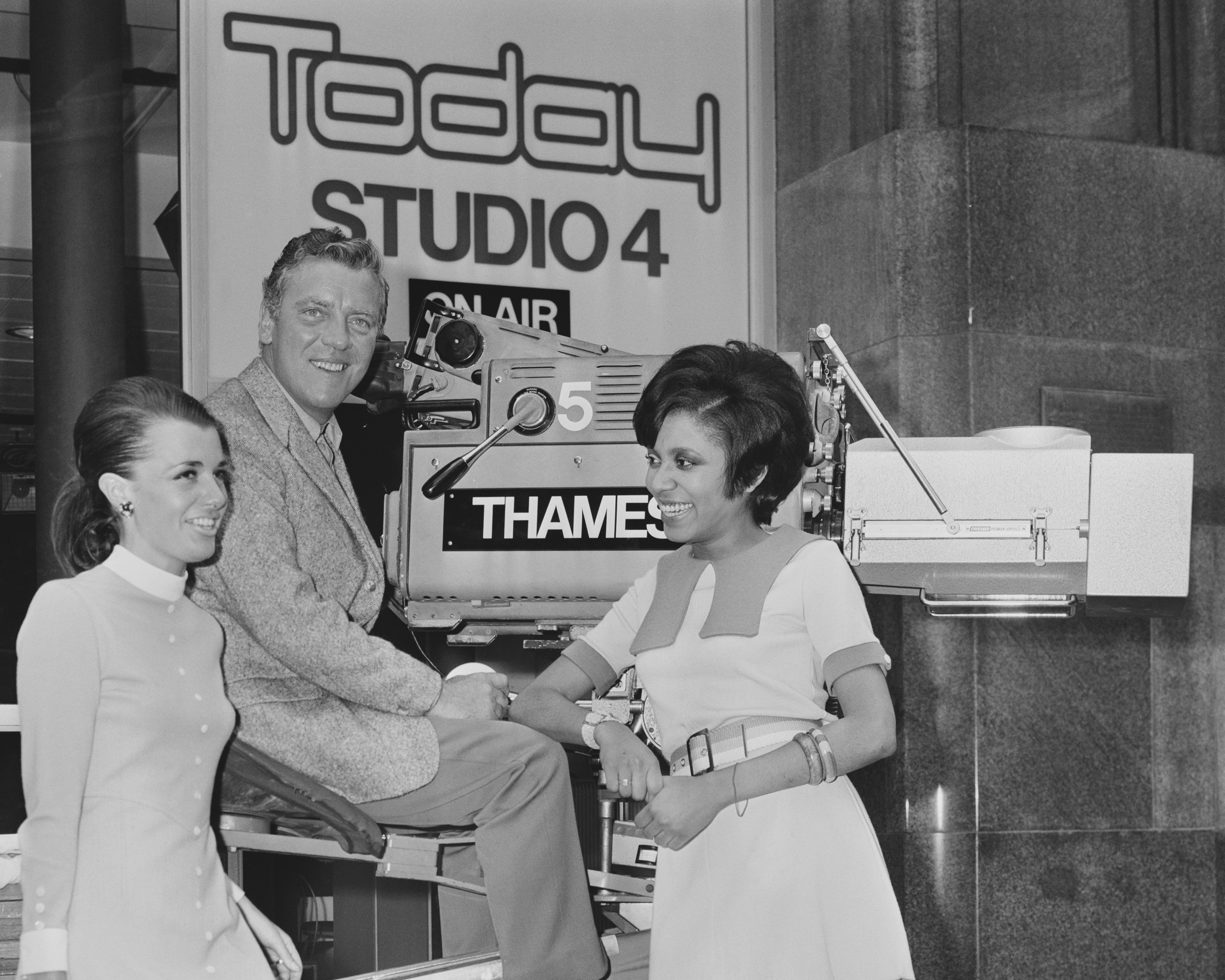 Irish radio and television presenter Eamonn Andrews (1922 - 1987), Jamaican journalist Barbara Blake-Hannah, and British reporter Jane Probyn at Thames Television’s ‘Today’ programme, UK, 29th July 1968.