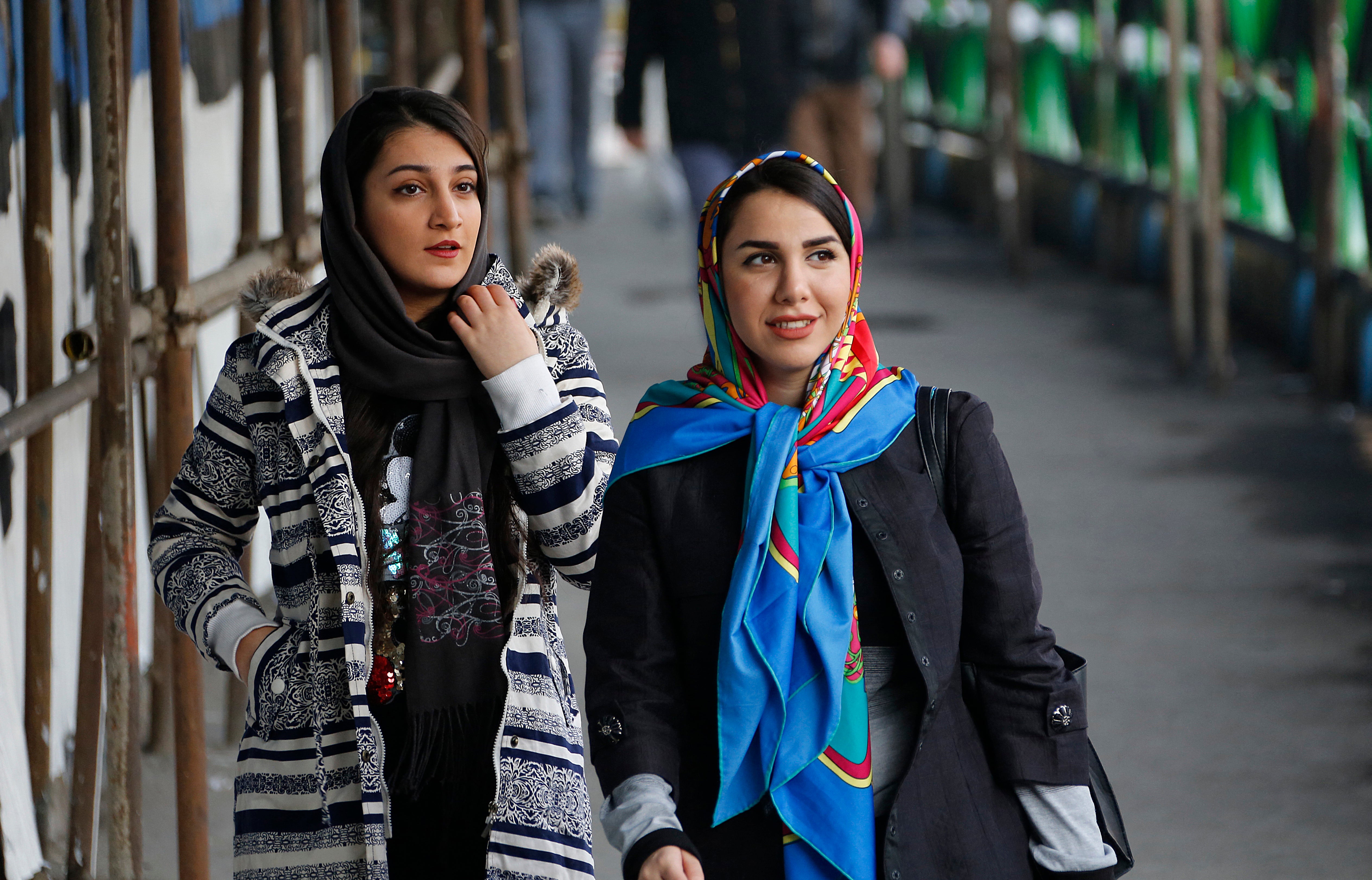 Iranian women removing headscarves to protest mandatory hijab laws The Independent pic