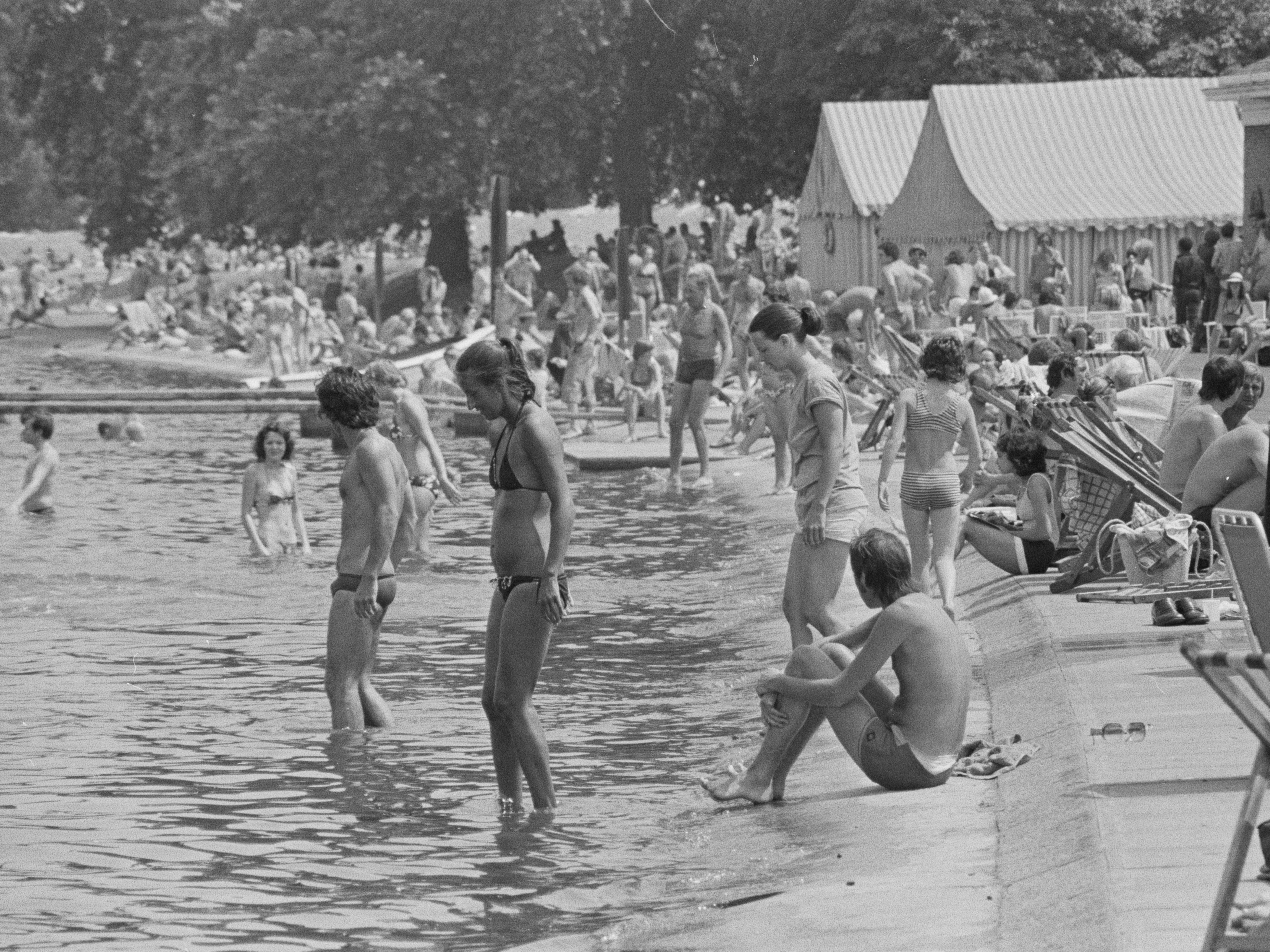 Londoners relaxing on the Serpentine in Hyde Park on 25 June 1976