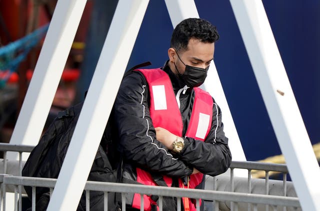 A group of people thought to be migrants are brought in to Dover (Gareth Fuller/PA)