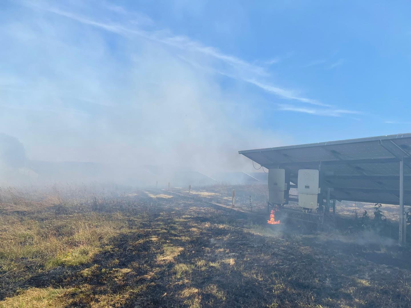 A solar panel farm ablaze in Verwood, Dorset