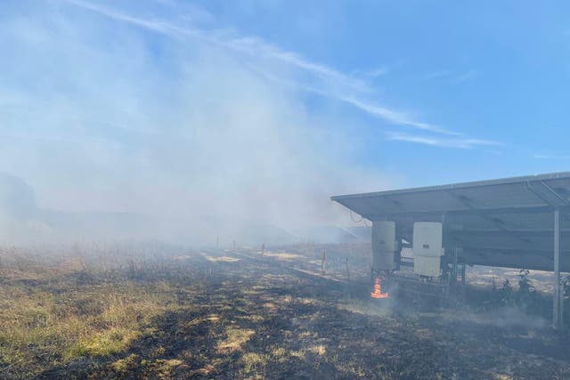 <p>A solar panel farm ablaze in Verwood, Dorset</p>