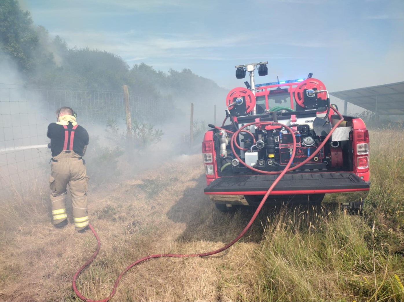 A firefighter tackling the blaze, of which the cause had yet to be ascertained