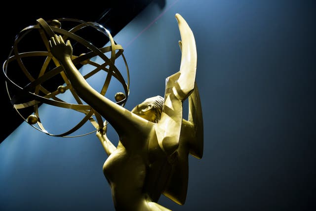 <p>Emmy Awards statue</p>
