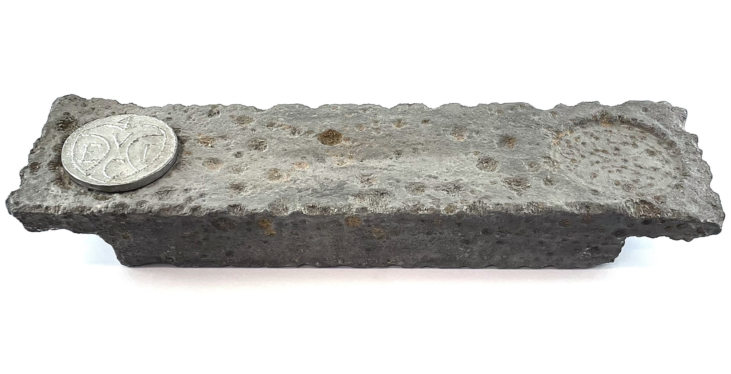 The ingot recovered from the wreck of the HMS Abergavenny (David Lay Auctions/PA)