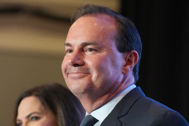 <p>Utah U.S. Sen. Mike Lee, with his wife Sharon Lee, talks to supporters during an Utah Republican election night party on Tuesday, June 28, 2022, in South Jordan, Utah</p>