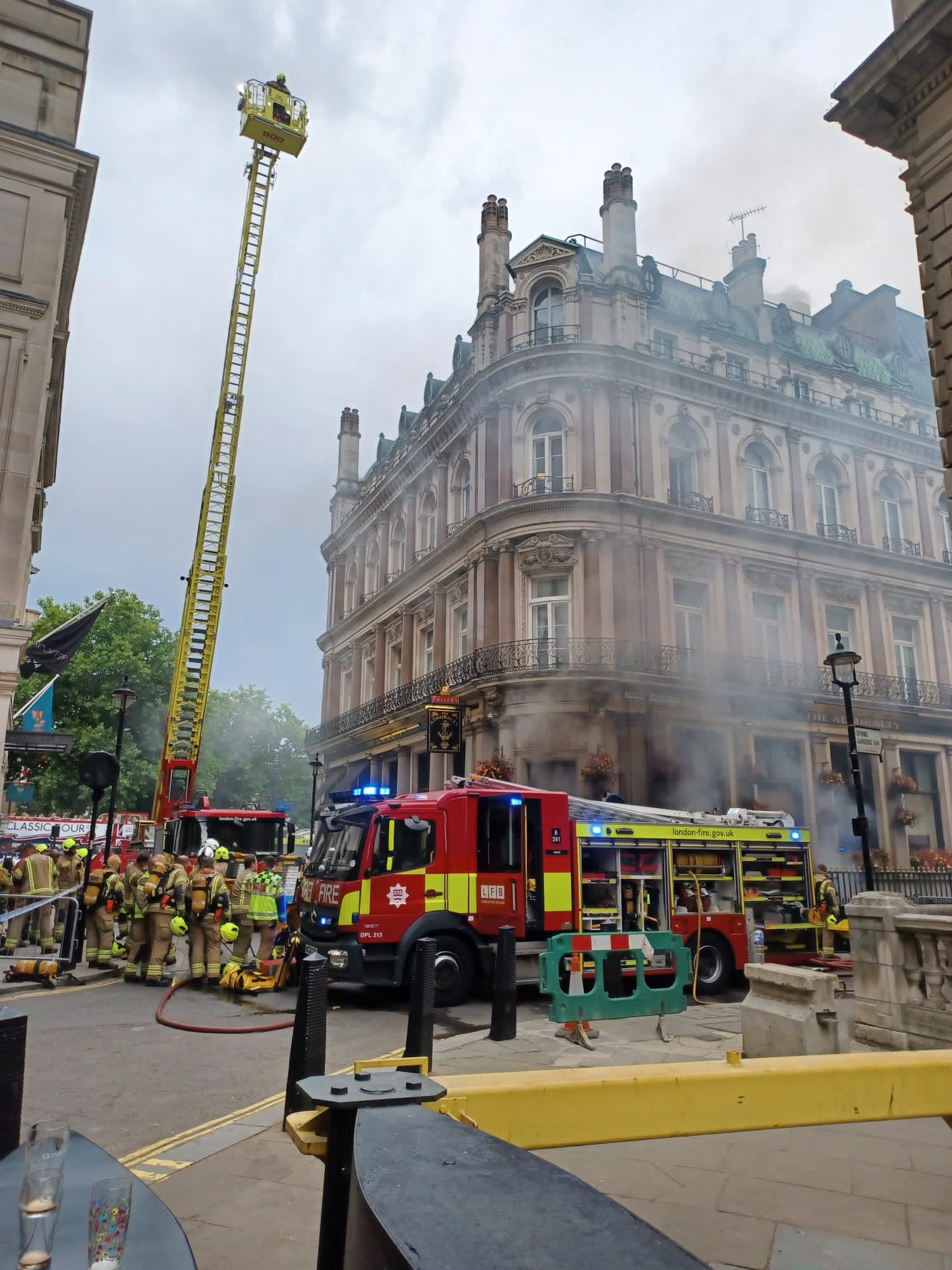 Firefighters battle a blaze in the basement of The Admiralty pub in Trafalgar Square (London Fire Brigade/PA)