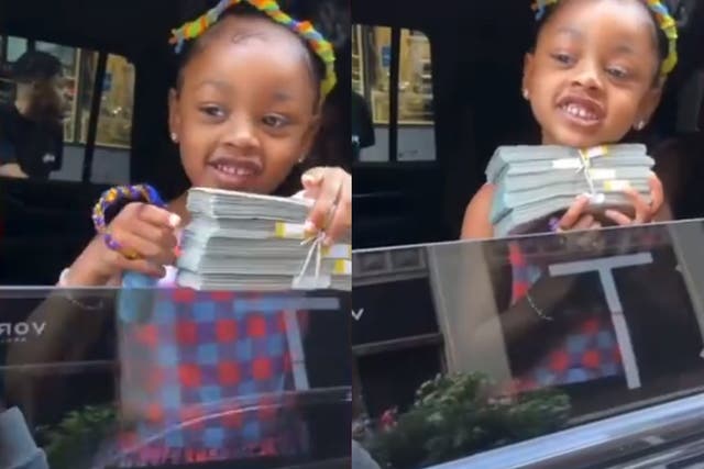 <p>Kulture, the eldest daughter of Cardi B and Offset, holds a stack of cash given to her for her birthday</p>