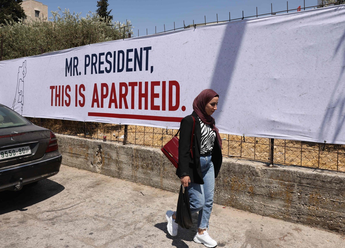 ‘This is apartheid’: Israeli human rights group hang billboards for Biden’s visit