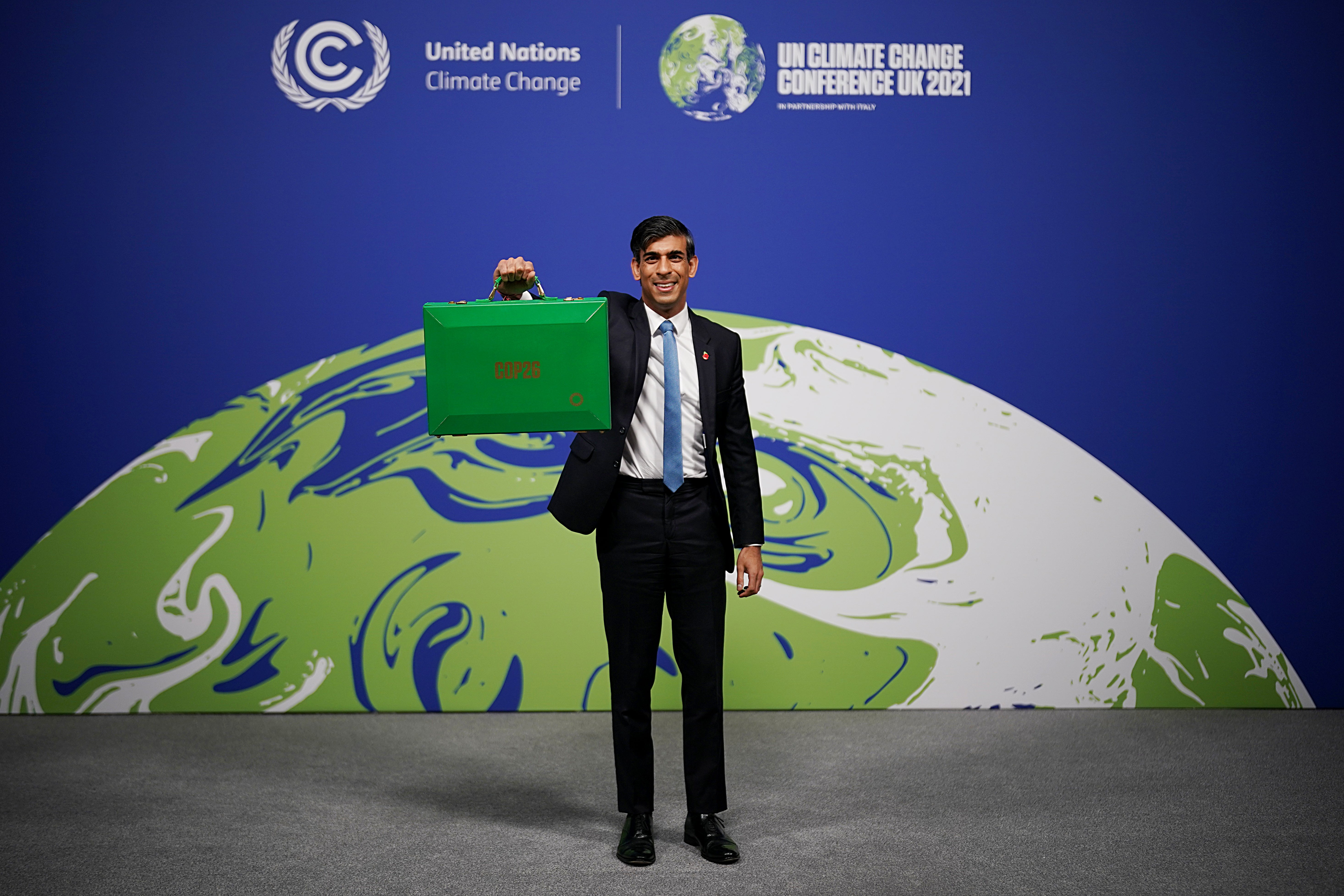 Rishi Sunak arrives at Cop 26 in Glasgow with his green budget box where he lead finance day